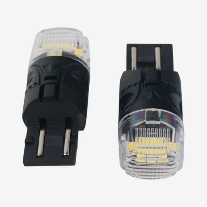 Светодиодные LED лампы T20 7443 (W21/5W) EA Light X 16SMD 360° белые двухконтактные безцокольные